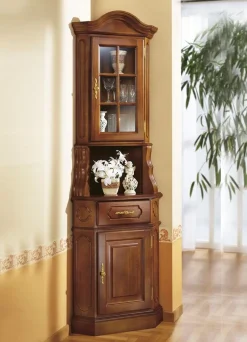 BADER Eckvitrine mit eleganten, goldfarbenen Metallgriffen